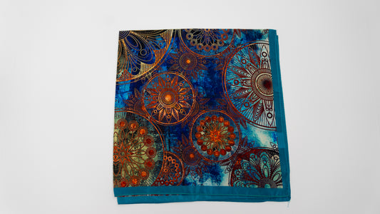 Vegan silk square bandana with intricate psychedelic patterns, folded.