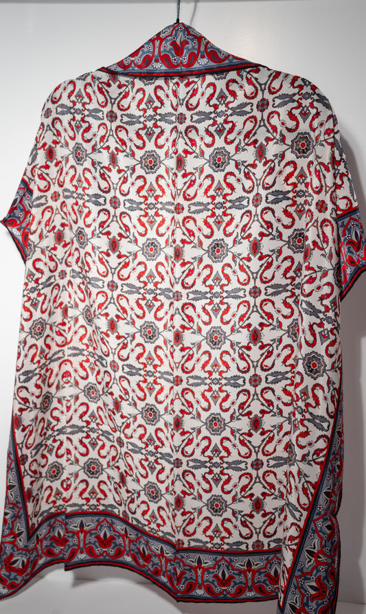 vegan silk scarf with white, grey, and  red tones. hanging open