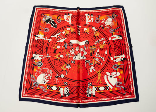 square silk scarf, 100% pure silk, design with humans and race horses, predominantly red and white tones.