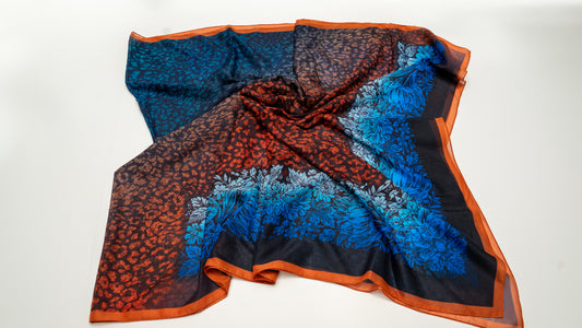 cotton voile shawl, featuring blue, black, and orange colours.