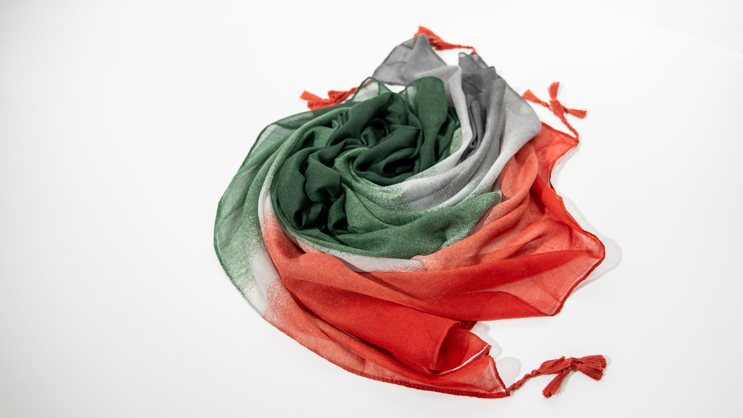 wool silk shawl with gray, white, green, and red, wrapped.