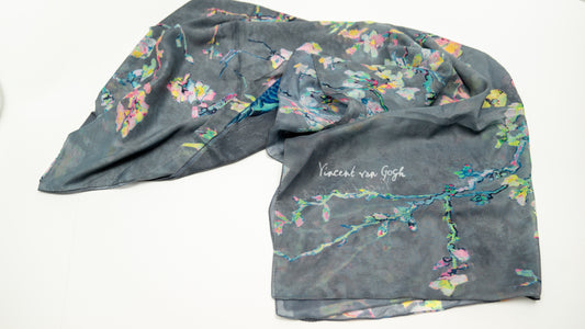 cotton voile shawl featuring a cherry blossom tree, tones of grey, blue, and pink, with a writing that says "Vincent van Gogh" on it