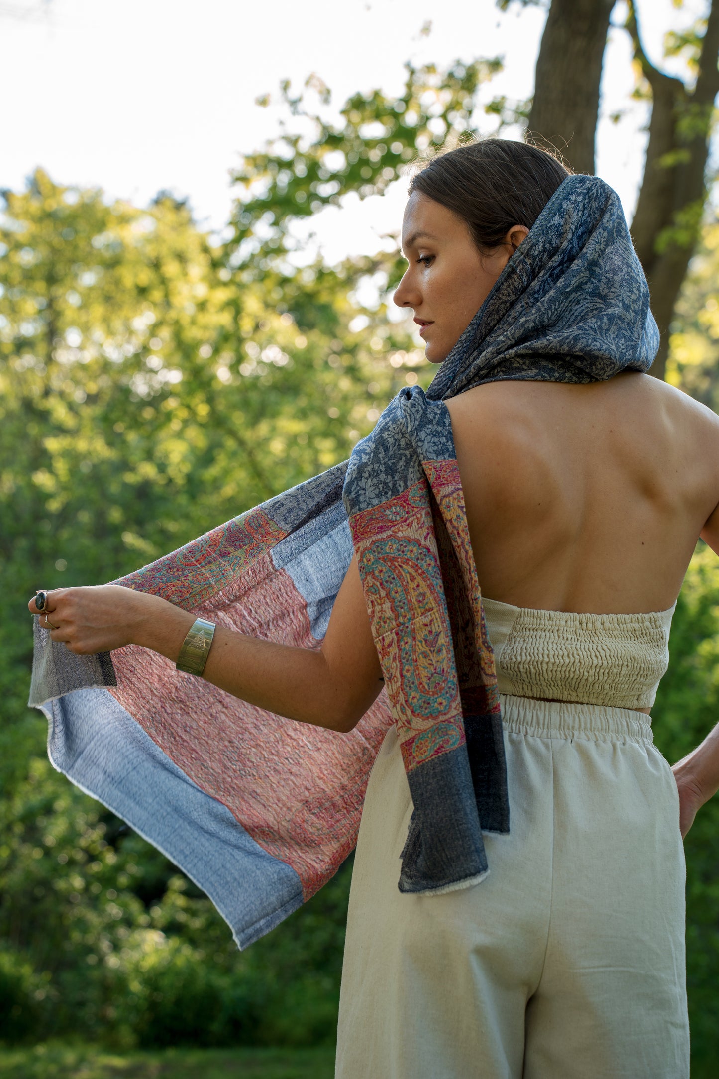 female model wearing a blue cashmere shawl
